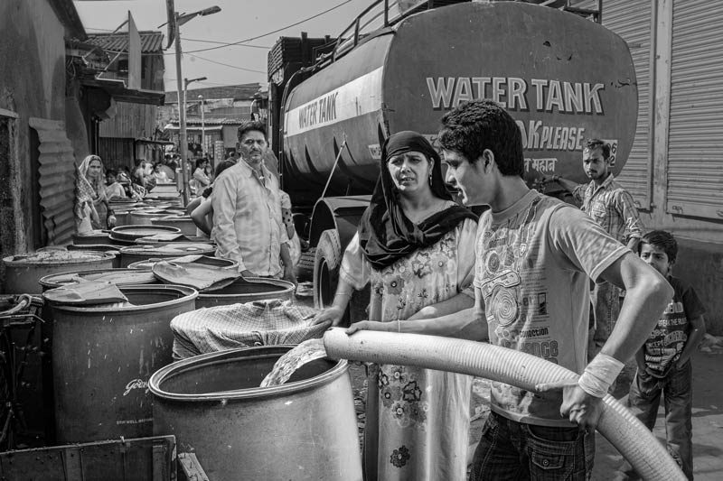 Impediments to enjoyment of Human Right to Water: 'Accessibility' Norm - Extra economic burden imposed by purchase of water from a private tanker in an unserved slum in Mumbai, Maharashtra